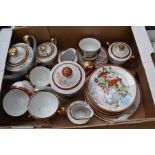 A circa 1920's Japanese tea set, decorated with Geisha girls head inside with a teapot, sugar and