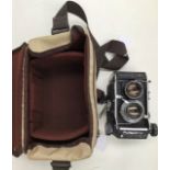 A Mamiya C330 Professional camera, complete with carrying case