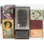 A collection of jewellery boxes to include a tooled leather case, a vintage tin depicting an Art