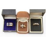 Three 9ct gold rings, comprising a sapphire set dress ring, with cabochon and faceted stones,