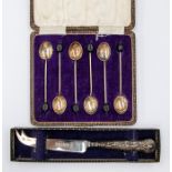 A set of George V silver coffee spoons with coffee bean terminals, Birmingham, 1924, cased