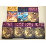 Collection of seven Harry Potter books: two first issue paperbacks of Prisoner of Azkaban; one