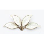 A David Andersen Norwegian Sterling silver and enamelled four leaf brooch, the enamel in a mother-