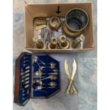 A collection of assorted brass ware comprising a pair of Victorian brass candlesticks, a further