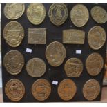 A collection of steam rolling brass plaques