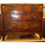 A George III mahogany chest of drawers, fitted with two short and two long drawers, bracket feet