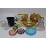 A group of English and other press moulded and coloured glassware, early 20th Century, including