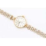 A 9ct gold Rotary ladies watch, round champagne dial, approx. 15mm, baton number markers, on