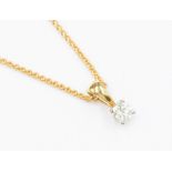 A diamond and 18ct gold pendant by Mappin & Webb, claw set, the diamond weighing approx. 0.30ct,