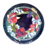 Moorcroft: 2 Moorcroft bowls, Iris pattern on blue ground, diameter approx 27cm and Fruit and