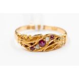 A late Victorian ruby and diamond 18ct gold ring, a curved row of alternate diamonds and rubies