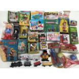 A collection of various toys most in original boxes and packets.