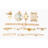 A collection of 9ct gold to include brooches, two set with stones some with base metal pins, along