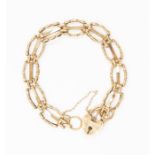 A 9ct gold ladies bracelet with ten links, heart shaped clasp, length 18cms approx. weight 11.