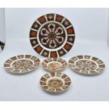 A collection of five Royal Crown Derby Imari 1128 plates to include lunch plate, two side plates and