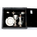 A George V silver presentation travelling communion set to include: Chalice; Paten; Communion Box;