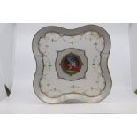A Continental porcelain cabaret tray, late 19th Century, of lobed square form and painted with a