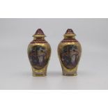 A pair of small Vienna-style vases and covers, circa 1900, of ovoid form with domed covers,