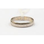 A platinum wedding band, width approx. 4mm, D shape, weight approx. 4.8gms