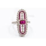 A ruby and diamond platinum ring Art Deco style ruby and diamond platinum ring, set to the centre