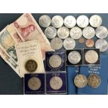 A collection of coins and banknotes to include 10 Shilling note, two 1 Pound notes, two Crowns