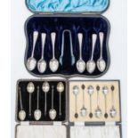 A set of George V silver and enamelled coffee spoons, Birmingham, 1931, boxed together with a set of
