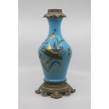 A French aesthetic movement opalescent glass lamp base, the blue opaque glass of mallet form,