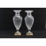 A pair of Georgian glass metal-mounted vases, early 19th Century, of amphora shape with everted