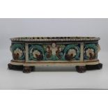 An Austrian majolica style flower trough, late 19th Century, of rectangular outline with rounded