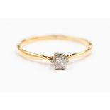 A diamond and 18ct gold solitaire ring, the brilliant cut diamond approx. 0.15ct, platinum claw