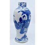 A 19th Century Chinese blue and white vase, hand painted depicting figures in a garden setting,