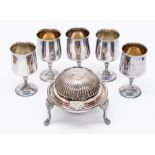 A silver plated muffin dish, footed, Sheffield, along with a set of five plated goblets with