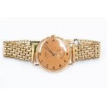 An 18ct gold cased Imperios gents watch, bronze tone dial, number markers with subsidiary dial,