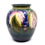 Moorcroft: A Moorcroft ovoid vase Leaf and Grape pattern. Height approx 26cm. Marked to base.