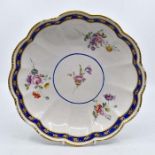 Derby Bridge Street plate, approx 1820, blue border, floral sprig decoration. Condition: Rubbing to