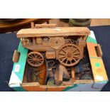 A collection of wooden items including a match steam roller, elephants toe, ivory items etc