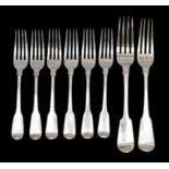 A set of six George III Fiddle pattern silver dessert forks, each reverse engraved with a crest,