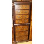 A George III walnut chest on chest, the upper section with four drawers, the lower section with