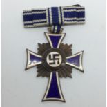 WW2 Third Reich Ehrenkreuz der Deutschen Mutter. Mothers Cross in Bronze complete with ribbon in pin