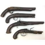 Three Flintlock pistols and one Percussion cap pistol. All have parts missing or serious damage.