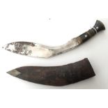 Kukri knife with 30cm blade. Overall length 41cm. Complete with scabbard. White metal chape. Both