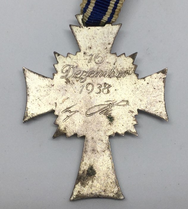 WW2 Third Reich Ehrenkreuz der Deutschen Mutter. Mothers Cross in Silver. Complete with a short - Image 2 of 2