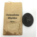 WW2 Third Reich Verwundeten Abzeichen in Schwarz. Wound badge in black complete in packet of issue