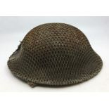 WW2 British MKII Steel helmet. 3 holes drilled to rim to denote non front line use. Original