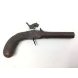 Percussion cap pistol with 75mm long barrel. Bore approx 11mm. Overall length 185mm. Folding