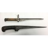 One dagger with a single edged 29cm long blade. Overall length 40cm. No scabbard. Together with a