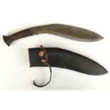 Kukri Knife 32cm long blade. No makers mark. Wooden grip with carved decoration. Overall length