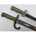 WW1 French Lebel Bayonet with 52cm long cruciform blade. Overall length 64cm. Serial numbered 48512.