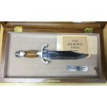 A cased "Jim Bowie Knife" by Franklin Mint. 215mm long saw backed stainless steel blade. Etched