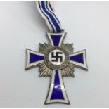 WW2 Third Reich Ehrenkreuz der Deutschen Mutter. Mothers Cross in Silver complete with a short